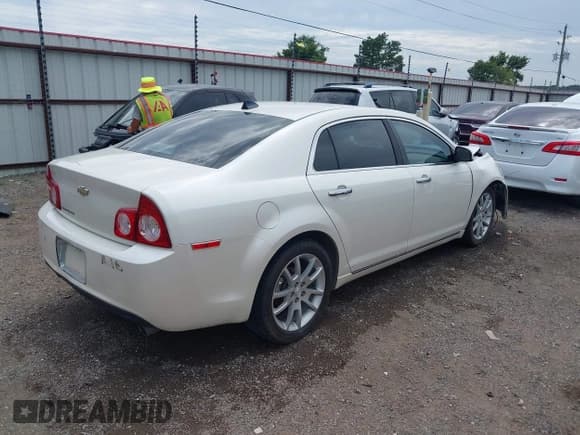 ✅ 2012 Chevrolet Malibu LTZ • VIN: 1G1ZG5E76CF151814 • Lot: 42790287. Listed on IAAI with 145,850 mi. Free auction sales archive from the USA and detailed vehicle history report at DreamBid. Image 4.