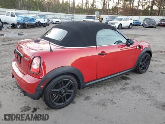 ✅ 2015 MINI Roadster • VIN: WMWSY1C58FT719774 • Lot: 84378614. Listed on Copart with 45,205 mi. Free auction sales archive from the USA and detailed vehicle history report at DreamBid. Image 3.