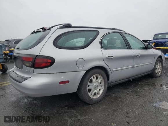 ✅ 2004 Mercury Sable LS Premium • VIN: 1MEHM59S54A605655 • Lot: 82005284. Listed on Copart with 101,723 mi. Free auction sales archive from the USA and detailed vehicle history report at DreamBid. Image 3.
