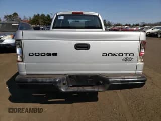 ✅ 2003 Dodge Dakota • VIN: 1D7HG12XX3S334064 • Lot: 48554465. Wystawiony na Copart z przebiegiem 140 660 mil. Bezpłatny archiwum sprzedaży aukcyjnych z USA i szczegółowy raport historii pojazdu na DreamBid. Zdjęcie 6.