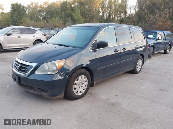 ✅ 2010 Honda Odyssey LX • VIN: 5FNRL3H23AB025337 • Lot: 43386261. Listed on IAAI with 212,698 mi. Free auction sales archive from the USA and detailed vehicle history report at DreamBid. Image 2.