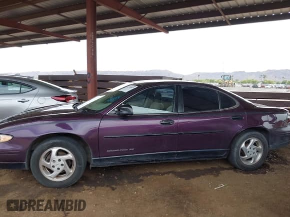 ✅ 1997 Pontiac Grand Prix • VIN: 1G2WJ52M3VF275181 • Lot: 42380049. Wystawiony na IAAI z przebiegiem 112 371 mil. Bezpłatny archiwum sprzedaży aukcyjnych z USA i szczegółowy raport historii pojazdu na DreamBid. Zdjęcie 14.