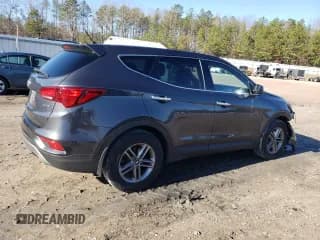 ✅ 2018 Hyundai Santa Fe 2.4L • VIN: 5XYZT3LB7JG564432 • Лот: 36313173. Опубликован ранее на Copart с пробегом 99 191 миль. Бесплатный доступ к архиву аукционных продаж из США и подробный отчёт об истории автомобиля на DreamBid. Изображение 3.