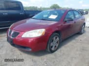 ✅ 2008 Pontiac G6 • VIN: 1G2ZG57B084109526 • Lot: 42798709. Listed on IAAI with 185,459 mi. Free auction sales archive from the USA and detailed vehicle history report at DreamBid. Image 2.