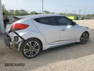 ✅ 2017 Hyundai Veloster Turbo • VIN: KMHTC6AE2HU310054 • Lot: 63442184. Wystawiony na Copart z przebiegiem 103 960 mil. Bezpłatny archiwum sprzedaży aukcyjnych z USA i szczegółowy raport historii pojazdu na DreamBid. Zdjęcie 3.