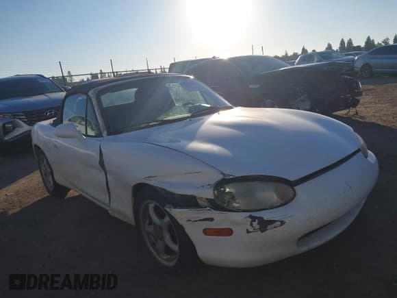 ✅ 1999 Mazda MX-5 Miata • VIN: JM1NB3535X0103235 • Lot: 43538556. Listed on IAAI with 238,235 mi. Free auction sales archive from the USA and detailed vehicle history report at DreamBid. Image 1.