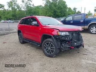 2017 Jeep Grand Cherokee Trailhawk with VIN 1C4RJFLT6HC940777, listed as a IAAI auction lot 42423934 with 79,448 mi miles and . Bid and sale history available at DreamBid. Image 1.