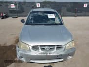 ✅ 2002 Hyundai Accent GS • VIN: KMHCG35C32U179011 • Lot: 43468979. Wystawiony na IAAI z przebiegiem 244 903 mil. Bezpłatny archiwum sprzedaży aukcyjnych z USA i szczegółowy raport historii pojazdu na DreamBid. Zdjęcie 12.