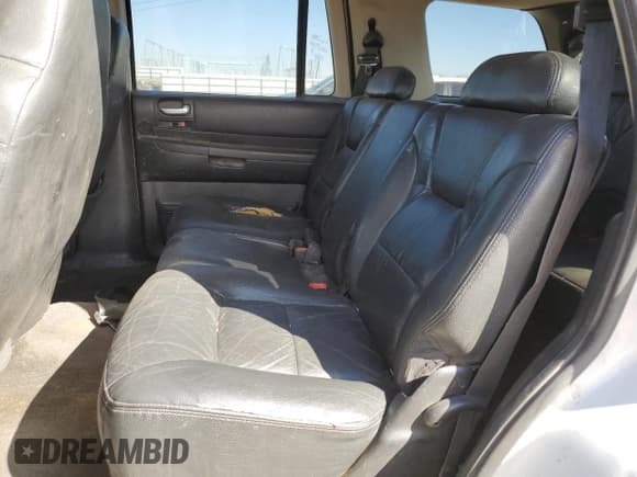 ✅ 2003 Dodge Durango SLT Plus • VIN: 1D4HS58N23F594685 • Лот: 81775725. Опубликован ранее на Copart с пробегом 346 844 миль. Бесплатный доступ к архиву аукционных продаж из США и подробный отчёт об истории автомобиля на DreamBid. Изображение 11.