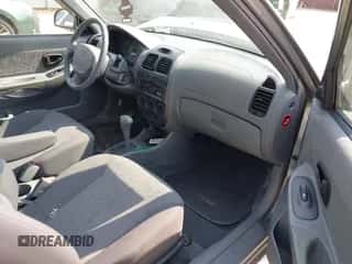 2003 Hyundai Accent GL with VIN KMHCG35CX3U243322, listed as a IAAI auction lot 42277841 with 45,855 mi miles and . Bid and sale history available at DreamBid. Image 5.