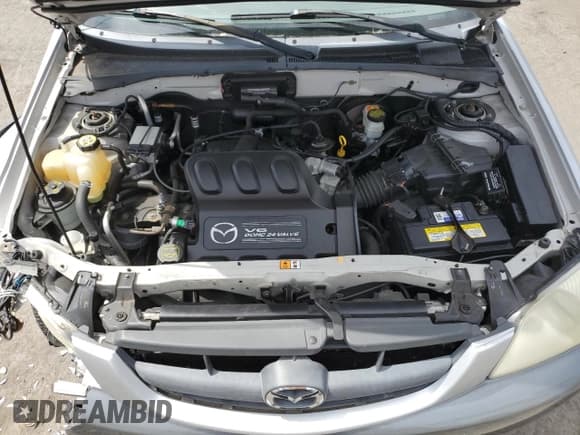 ✅ 2001 Mazda Tribute LX • VIN: 4F2CU08171KM64973 • Lot: 67452495. Listed on Copart with 160,864 mi. Free auction sales archive from the USA and detailed vehicle history report at DreamBid. Image 12.