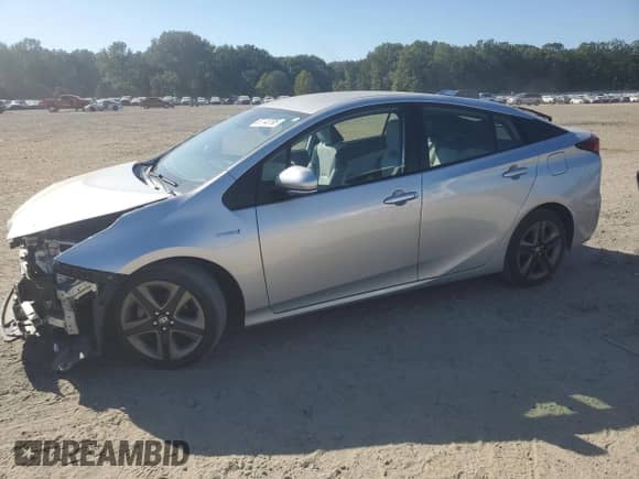 2021 Toyota Prius L Eco with VIN JTDKAMFU7M3137514, listed as a Copart auction lot 85843795 with 31,718 mi miles and Salvage title. Bid and sale history available at DreamBid. Image 1.