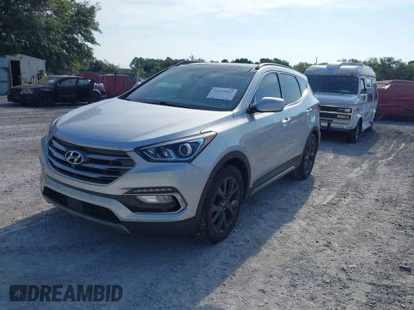 ✅ 2017 Hyundai Santa Fe Ultimate • VIN: 5XYZW4LA7HG407577 • Lot: 42429017. Listed on IAAI with 149,674 mi. Free auction sales archive from the USA and detailed vehicle history report at DreamBid. Image 18.