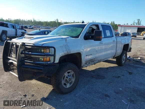 ✅ 2018 Chevrolet Silverado 2500HD LT • VIN: 1GC1KVEY7JF242793 • Лот: 43004192. Опубликован ранее на IAAI с пробегом Не указан. Бесплатный доступ к архиву аукционных продаж из США и подробный отчёт об истории автомобиля на DreamBid. Изображение 2.