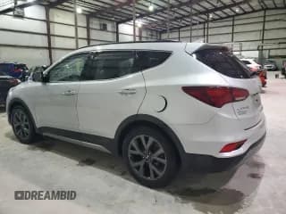 ✅ 2017 Hyundai Santa Fe Ultimate • VIN: 5XYZW4LA0HG398544 • Лот: 49573804. Опубликован ранее на Copart с пробегом 117 478 миль. Бесплатный доступ к архиву аукционных продаж из США и подробный отчёт об истории автомобиля на DreamBid. Изображение 2.