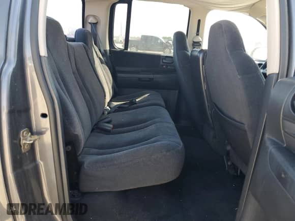 2003 Dodge Dakota SLT z VIN 1D7HL48X03S114761, wystawiony jako Copart lot #52323405 z przebiegiem 137 105 mil mil oraz Szkoda całkowita • Salvage title. Historia ofert i sprzedaży dostępna na DreamBid. Obrazek 10.