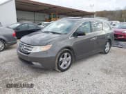 ✅ 2012 Honda Odyssey Touring • VIN: 5FNRL5H92CB083290 • Lot: 43664749. Listed on IAAI with 315,361 mi. Free auction sales archive from the USA and detailed vehicle history report at DreamBid. Image 2.