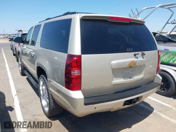 2014 Chevrolet Suburban LT z VIN 1GNSCJE05ER117100, wystawiony jako IAAI lot #42624986 z przebiegiem 198 729 mil mil oraz . Historia ofert i sprzedaży dostępna na DreamBid. Obrazek 3.