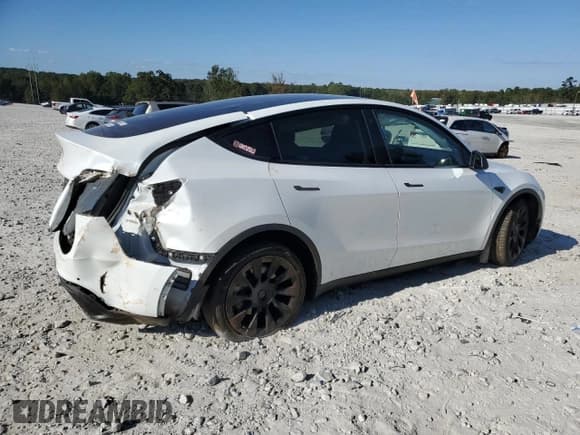 ✅ 2021 Tesla Model Y Standard Range • VIN: 5YJYGDED3MF105916 • Lot: 86725795. Listed on Copart with 68,895 mi. Free auction sales archive from the USA and detailed vehicle history report at DreamBid. Image 3.