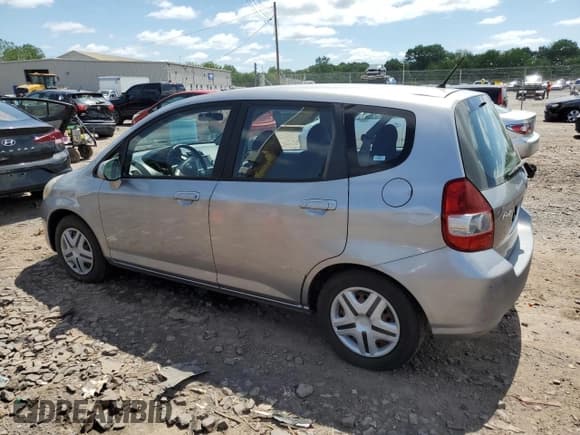 ✅ 2007 Honda Fit • VIN: JHMGD38457S043676 • Lot: 57217005. Listed on Copart with 208,480 mi. Free auction sales archive from the USA and detailed vehicle history report at DreamBid. Image 2.