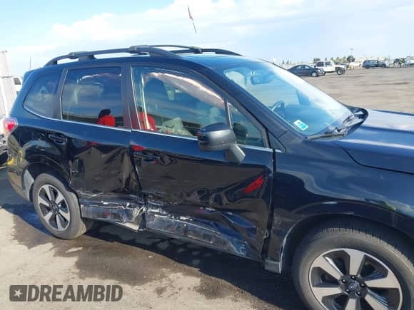 2017 Subaru Forester Limited with VIN JF2SJARC0HH803155, listed as a IAAI auction lot 43085830 with 101,984 mi miles and . Bid and sale history available at DreamBid. Image 6.