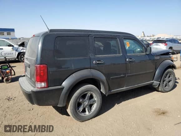 2008 Dodge Nitro SXT с VIN 1D8GU28K58W219907, выставлен на аукционе Copart как лот 77009104 с пробегом Не указан миль и Списание • Salvage title. История ставок и продаж доступна на DreamBid. Изображение 3.