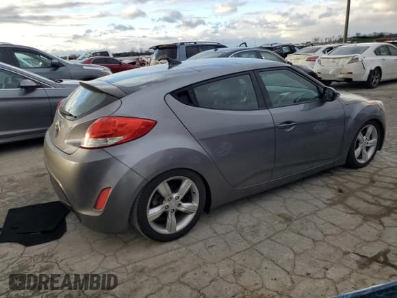 ✅ 2014 Hyundai Veloster RE:FLEX • VIN: KMHTC6AD2EU216453 • Lot: 87090324. Wystawiony na Copart z przebiegiem 147 771 mil. Bezpłatny archiwum sprzedaży aukcyjnych z USA i szczegółowy raport historii pojazdu na DreamBid. Zdjęcie 3.