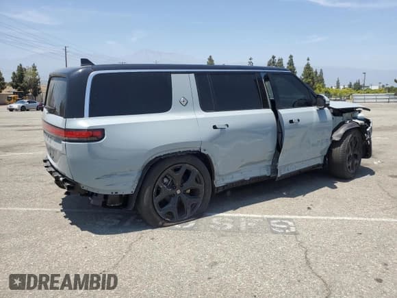 ✅ 2024 Rivian R1S Adventure • VIN: 7PDSGBBA3RN038417 • Лот: 60934775. Опубликован ранее на Copart с пробегом 22 772 миль. Бесплатный доступ к архиву аукционных продаж из США и подробный отчёт об истории автомобиля на DreamBid. Изображение 3.