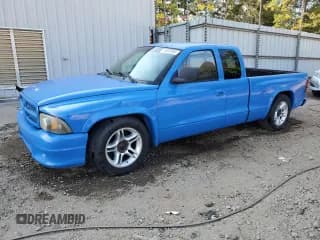 ✅ 1999 Dodge Dakota Sport • VIN: 1B7GL22Z2XS312168 • Lot: 76039264. Listed on Copart with 208,858 mi. Free auction sales archive from the USA and detailed vehicle history report at DreamBid. Image 1.