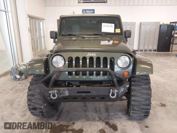 ✅ 2008 Jeep Wrangler Unlimited Sahara • VIN: 1J4GA59158L504309 • Lot: 43292936. Listed on IAAI with 147,545 mi. Free auction sales archive from the USA and detailed vehicle history report at DreamBid. Image 13.