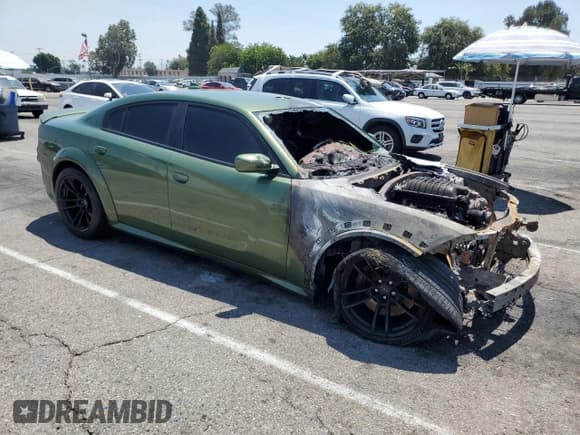 ✅ 2022 Dodge Charger SRT Hellcat Widebody • VIN: 2C3CDXL93NH116756 • Лот: 67646805. Опубликован ранее на Copart с пробегом Не указан. Бесплатный доступ к архиву аукционных продаж из США и подробный отчёт об истории автомобиля на DreamBid. Изображение 4.