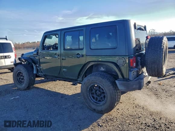 ✅ 2008 Jeep Wrangler Unlimited Sahara • VIN: 1J8GA59148L553239 • Lot: 94098485. Listed on Copart with 136,730 mi. Free auction sales archive from the USA and detailed vehicle history report at DreamBid. Image 2.