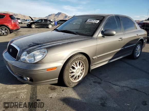 2002 Hyundai Sonata с VIN KMHWF25S32A527229, выставлен на аукционе Copart как лот 86625724 с пробегом 71 042 миль миль и Чистый • Clean title. История ставок и продаж доступна на DreamBid. Изображение 1.