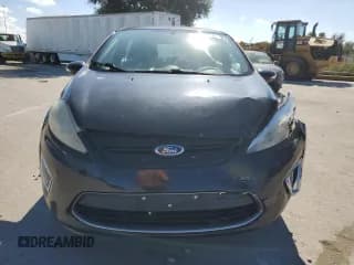 ✅ 2011 Ford Fiesta SES • VIN: 3FADP4FJ1BM148426 • Lot: 86828275. Listed on Copart with 142,206 mi. Free auction sales archive from the USA and detailed vehicle history report at DreamBid. Image 5.