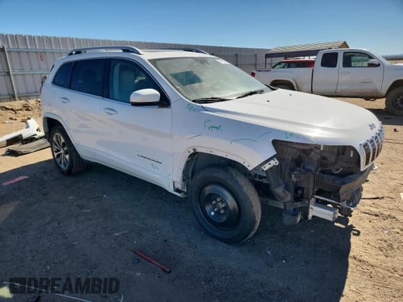✅ 2019 Jeep Cherokee Overland • VIN: 1C4PJMJNXKD142672 • Lot: 90723995. Listed on Copart with 85,288 mi. Free auction sales archive from the USA and detailed vehicle history report at DreamBid. Image 4.