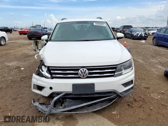 ✅ 2021 Volkswagen Tiguan S • VIN: 3VV1B7AX9MM021629 • Лот: 69080865. Опубликован ранее на Copart с пробегом 64 079 миль. Бесплатный доступ к архиву аукционных продаж из США и подробный отчёт об истории автомобиля на DreamBid. Изображение 5.
