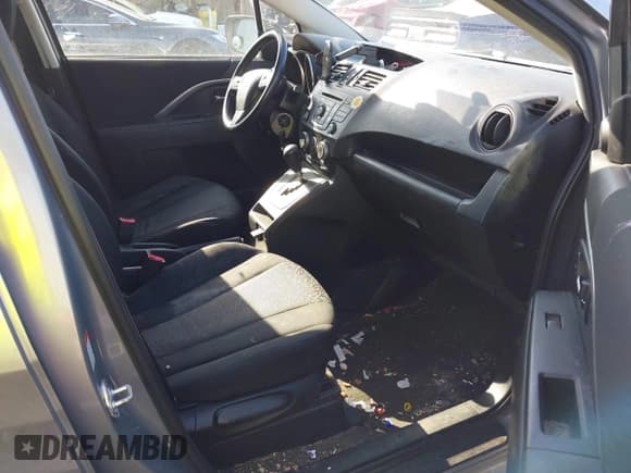 ✅ 2012 Mazda 5 Sport • VIN: JM1CW2BL3C0115906 • Lot: 42062899. Listed on IAAI with 124,286 mi. Free auction sales archive from the USA and detailed vehicle history report at DreamBid. Image 5.