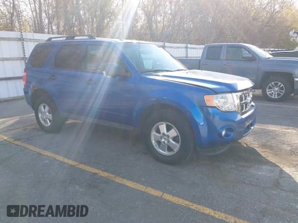 ✅ 2012 Ford Escape XLT • VIN: 1FMCU0D74CKB02656 • Lot: 43596055. Listed on IAAI with 112,403 mi. Free auction sales archive from the USA and detailed vehicle history report at DreamBid. Image 1.