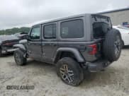 ✅ 2025 Jeep Wrangler Sahara • VIN: 1C4PJXEN0SW592086 • Лот: 59791885. Опубликован ранее на Copart с пробегом 1 124 миль. Бесплатный доступ к архиву аукционных продаж из США и подробный отчёт об истории автомобиля на DreamBid. Изображение 2.