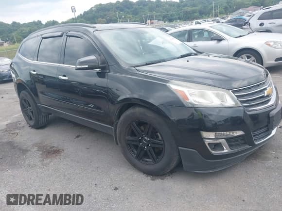 ✅ 2015 Chevrolet Traverse LT • VIN: 1GNKRHKD9FJ198777 • Lot: 42926991. Listed on IAAI with 153,634 mi. Free auction sales archive from the USA and detailed vehicle history report at DreamBid. Image 1.