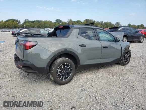 2024 Hyundai Santa Cruz SEL с VIN 5NTJC4DE7RH122008, выставлен на аукционе Copart как лот 72901344 с пробегом 6 903 миль миль и На запчасти • Non repairable. История ставок и продаж доступна на DreamBid. Изображение 3.