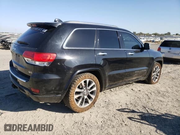 ✅ 2017 Jeep Grand Cherokee Overland • VIN: 1C4RJFCG7HC942105 • Lot: 81501275. Listed on Copart with 174,735 mi. Free auction sales archive from the USA and detailed vehicle history report at DreamBid. Image 3.