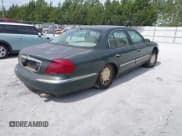 ✅ 1998 Lincoln Continental • VIN: 1LNFM97V6WY671313 • Lot: 42304977. Wystawiony na IAAI z przebiegiem 204 876 mil. Bezpłatny archiwum sprzedaży aukcyjnych z USA i szczegółowy raport historii pojazdu na DreamBid. Zdjęcie 4.