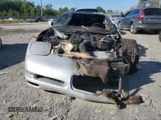 1999 Chevrolet Corvette z VIN 1G1YY22G2X5102374, wystawiony jako Copart lot #67140774 z przebiegiem Nie podano mil oraz Szkoda całkowita • Salvage title. Historia ofert i sprzedaży dostępna na DreamBid. Obrazek 5.