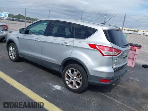 ✅ 2013 Ford Escape SEL • VIN: 1FMCU0H98DUD10959 • Lot: 43637339. Listed on IAAI with 152,762 mi. Free auction sales archive from the USA and detailed vehicle history report at DreamBid. Image 3.