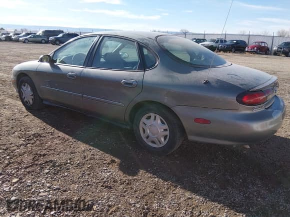 ✅ 1999 Ford Taurus SE • VIN: 1FAFP53U1XG314975 • Lot: 43888557. Wystawiony na IAAI z przebiegiem 109 373 mil. Bezpłatny archiwum sprzedaży aukcyjnych z USA i szczegółowy raport historii pojazdu na DreamBid. Zdjęcie 3.