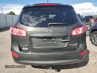 2011 Hyundai Santa Fe Limited z VIN 5XYZKDAG8BG061887, wystawiony jako Copart lot #68511294 z przebiegiem 176 337 mil mil oraz Szkoda całkowita • Salvage title. Historia ofert i sprzedaży dostępna na DreamBid. Obrazek 6.