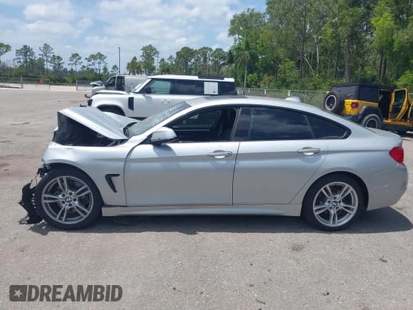 ✅ 2015 BMW 4 Series 428i • VIN: WBA4A5C54FG051727 • Lot: 42110901. Wystawiony na IAAI z przebiegiem 87 326 mil. Bezpłatny archiwum sprzedaży aukcyjnych z USA i szczegółowy raport historii pojazdu na DreamBid. Zdjęcie 13.