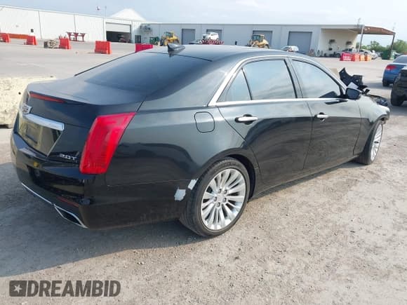 ✅ 2015 Cadillac CTS Luxury RWD • VIN: 1G6AR5SX2F0141438 • Lot: 43004019. Listed on IAAI with 143,885 mi. Free auction sales archive from the USA and detailed vehicle history report at DreamBid. Image 4.