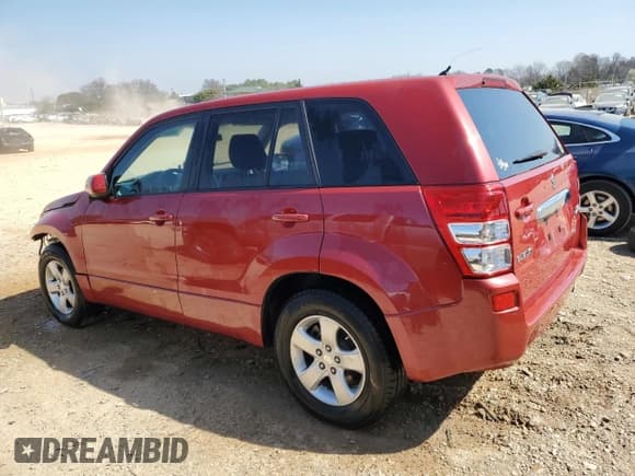 ✅ 2012 Suzuki Grand Vitara Premium • VIN: JS3TE0D62C4100130 • Lot: 48662145. Listed on Copart with 81,557 mi. Free auction sales archive from the USA and detailed vehicle history report at DreamBid. Image 2.